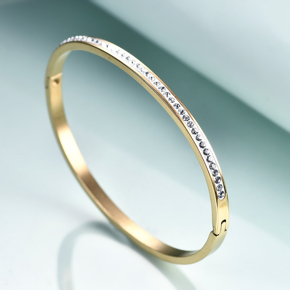 Bracelet de type bangle en stainless steel or avec cristaux